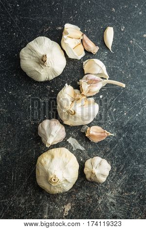 Fresh garlic on kitchen table. Top view.