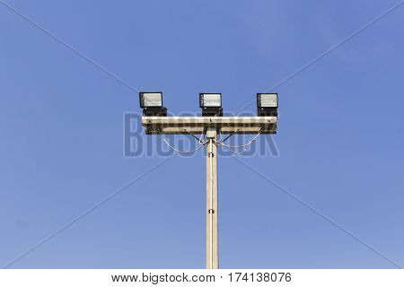 spot light electric pole on blue sky
