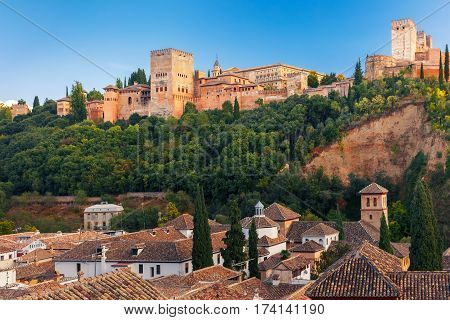 Palace and fortress complex Alhambra and old town area of Albaicin during sunset in Granada, Andalusia, Spain