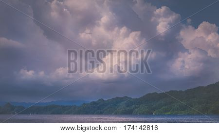 Clouds above Kabui Bay near Waigeo before Thunderstorm. West Papuan, Raja Ampat. Indonesia