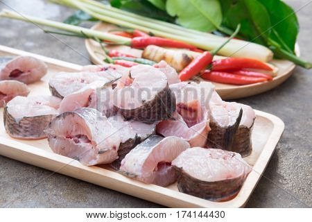 Striped snakehead fish chopped preparing for cooking Tom Yam Thai style hot food
