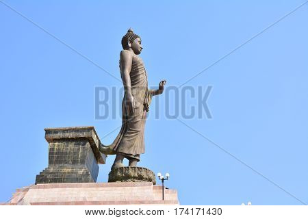 Big standing Buddha statue landscape under the sky