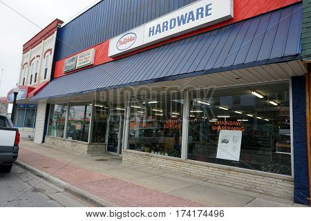 MANCELONA, MICHIGAN / UNITED STATES - NOVEMBER 27, 2016: The Mancelon True Value Hardware store offers craft supplies and chainsaw sharpening in downtown Mancelona.