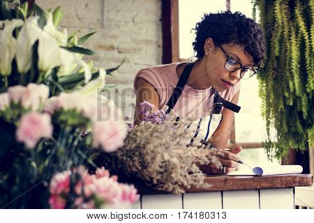 Business of flower shop with woman owner