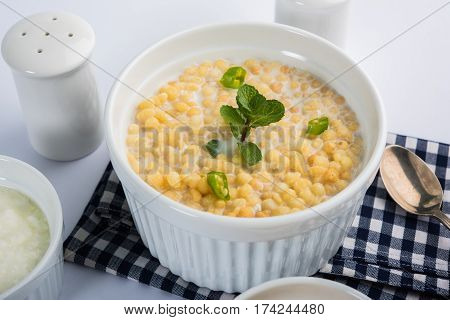 Dahi Bundi or Boondi Raita, favourite indian started or side dish made using Rajasthani snack food made from sweetened, fried chickpea flour, called Boondi with sweet and salty curd or buttermilk