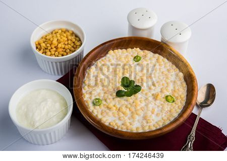 Dahi Bundi or Boondi Raita, favourite indian started or side dish made using Rajasthani snack food made from sweetened, fried chickpea flour, called Boondi with sweet and salty curd or buttermilk