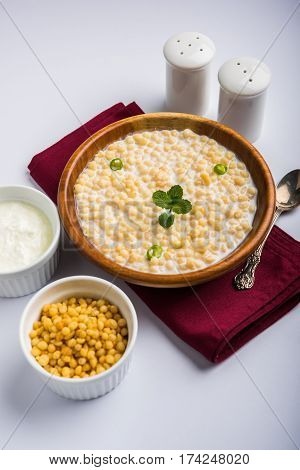 Dahi Bundi or Boondi Raita, favourite indian started or side dish made using Rajasthani snack food made from sweetened, fried chickpea flour, called Boondi with sweet and salty curd or buttermilk