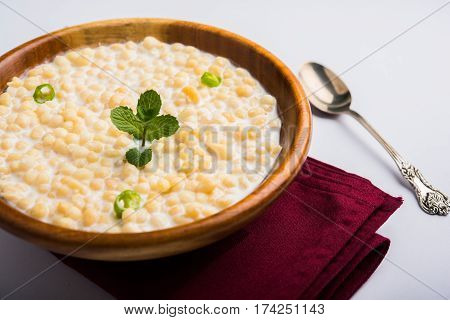Dahi Bundi or Boondi Raita, favourite indian started or side dish made using Rajasthani snack food made from sweetened, fried chickpea flour, called Boondi with sweet and salty curd or buttermilk