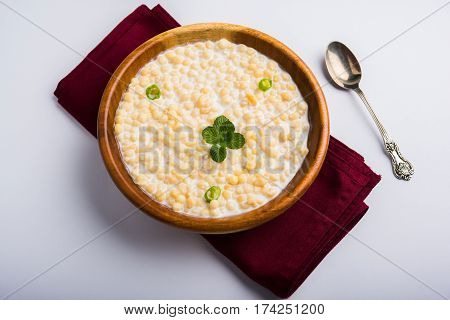 Dahi Bundi or Boondi Raita, favourite indian started or side dish made using Rajasthani snack food made from sweetened, fried chickpea flour, called Boondi with sweet and salty curd or buttermilk