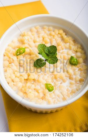 Dahi Bundi or Boondi Raita, favourite indian started or side dish made using Rajasthani snack food made from sweetened, fried chickpea flour, called Boondi with sweet and salty curd or buttermilk