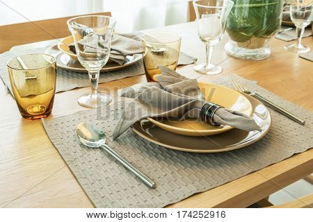 Empty Plate With Service Ware On Wooden Table