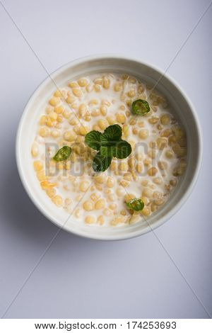 Dahi Bundi or Boondi Raita, favourite indian started or side dish made using Rajasthani snack food made from sweetened, fried chickpea flour, called Boondi with sweet and salty curd or buttermilk