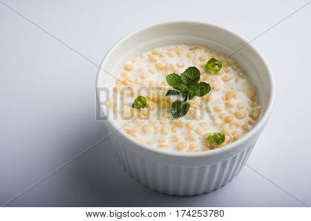 Dahi Bundi or Boondi Raita, favourite indian started or side dish made using Rajasthani snack food made from sweetened, fried chickpea flour, called Boondi with sweet and salty curd or buttermilk