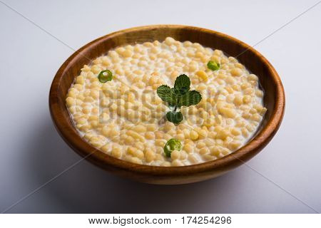 Dahi Bundi or Boondi Raita, favourite indian started or side dish made using Rajasthani snack food made from sweetened, fried chickpea flour, called Boondi with sweet and salty curd or buttermilk