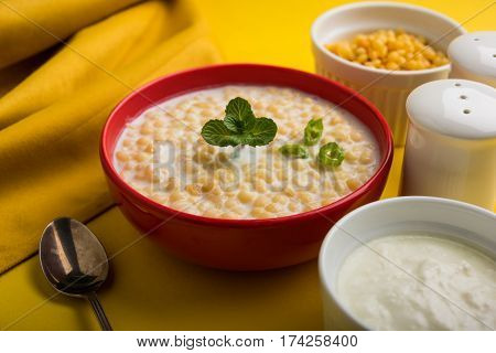 Dahi Bundi or Boondi Raita, favourite indian started or side dish made using Rajasthani snack food made from sweetened, fried chickpea flour, called Boondi with sweet and salty curd or buttermilk