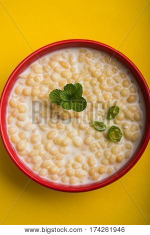 Dahi Bundi or Boondi Raita, favourite indian started or side dish made using Rajasthani snack food made from sweetened, fried chickpea flour, called Boondi with sweet and salty curd or buttermilk