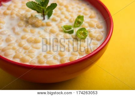 Dahi Bundi or Boondi Raita, favourite indian started or side dish made using Rajasthani snack food made from sweetened, fried chickpea flour, called Boondi with sweet and salty curd or buttermilk