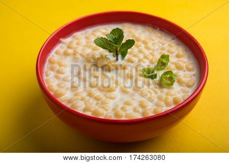 Dahi Bundi or Boondi Raita, favourite indian started or side dish made using Rajasthani snack food made from sweetened, fried chickpea flour, called Boondi with sweet and salty curd or buttermilk