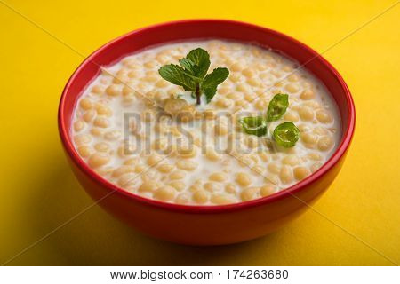 Dahi Bundi or Boondi Raita, favourite indian started or side dish made using Rajasthani snack food made from sweetened, fried chickpea flour, called Boondi with sweet and salty curd or buttermilk