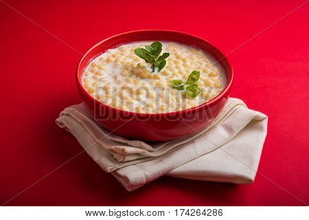 Dahi Bundi or Boondi Raita, favourite indian started or side dish made using Rajasthani snack food made from sweetened, fried chickpea flour, called Boondi with sweet and salty curd or buttermilk