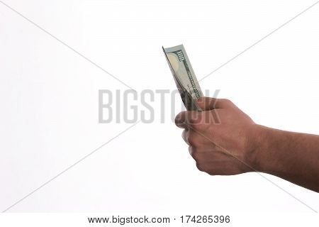 Close-up Of Person Hand Giving US dollar banknote money. Сoncept of salary.