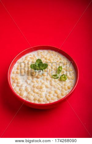 Dahi Bundi or Boondi Raita, favourite indian started or side dish made using Rajasthani snack food made from sweetened, fried chickpea flour, called Boondi with sweet and salty curd or buttermilk