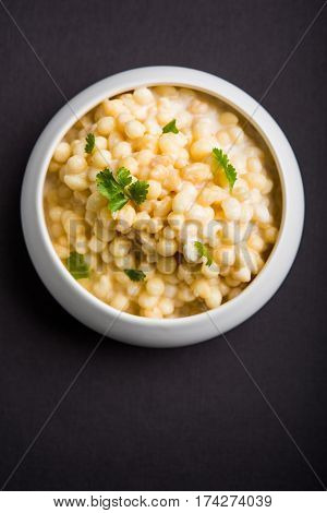 Dahi Bundi or Boondi Raita, favourite indian started or side dish made using Rajasthani snack food made from sweetened, fried chickpea flour, called Boondi with sweet and salty curd or buttermilk