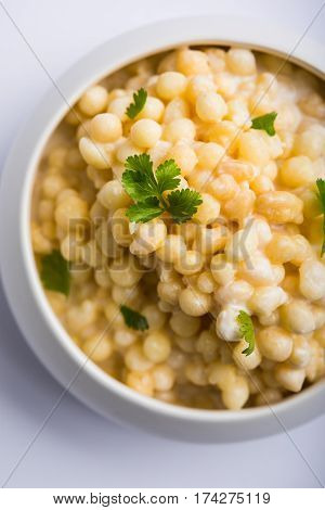 Dahi Bundi or Boondi Raita, favourite indian started or side dish made using Rajasthani snack food made from sweetened, fried chickpea flour, called Boondi with sweet and salty curd or buttermilk