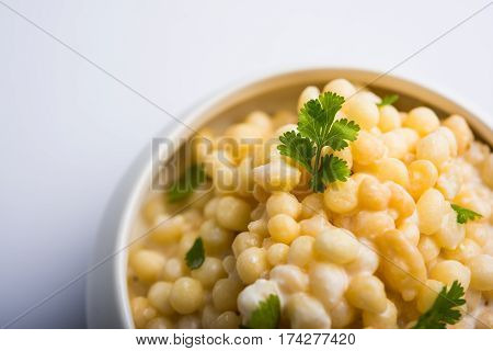 Dahi Bundi or Boondi Raita, favourite indian started or side dish made using Rajasthani snack food made from sweetened, fried chickpea flour, called Boondi with sweet and salty curd or buttermilk