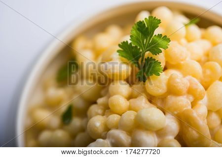 Dahi Bundi or Boondi Raita, favourite indian started or side dish made using Rajasthani snack food made from sweetened, fried chickpea flour, called Boondi with sweet and salty curd or buttermilk