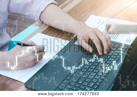 Business Trading Concept : Man Trade Stock And Forex By Laptop