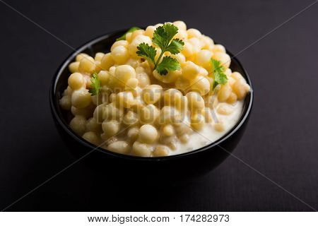 Dahi Bundi or Boondi Raita, favourite indian started or side dish made using Rajasthani snack food made from sweetened, fried chickpea flour, called Boondi with sweet and salty curd or buttermilk