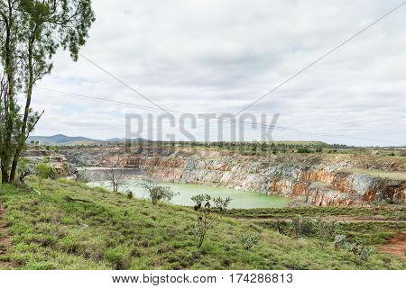 Old open cut gold mine now full with water and no longer used at Ravenswood Queensland Australia