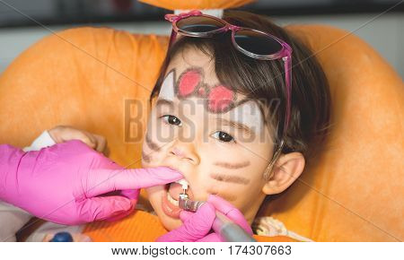 Young funny girl at dentist. dental treatment