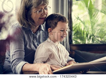 Grandmother Grandson Family Reading Book