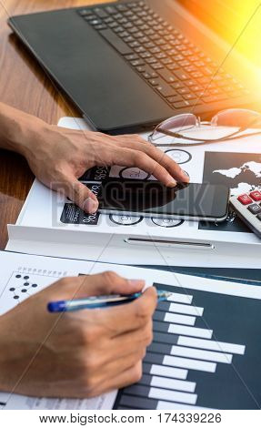 Business Workers Discussing Digital Graphs And Diagrams Indicating Progres.