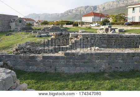 Ruins of ancient roman town Salona near Split, Dalmatia, Croatia in evening dusk