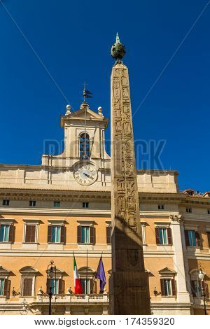Obelisk Of Montecitorio And Palazzo Montecitorio In Piazza Di Monte Citorio, Rome, Italy