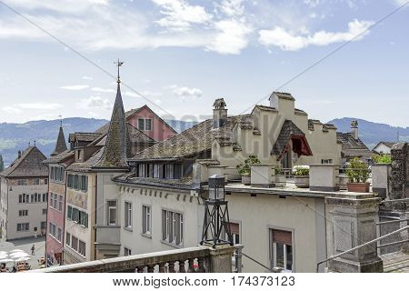 RAPPERSWIL SWITZERLAND - MAY 10 2016: Buildings of the city seen from the staircase leading from the town square to the castle