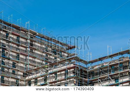 building construction site with scaffolding - building industry