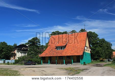 Old former german building in the Morskoe (Pillkoppen) village in the Curonian Spit National Park. Russia.