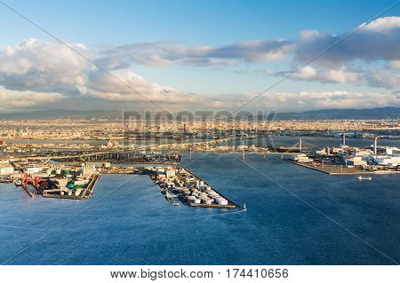 Industrial District at Osaka Bay and city downtown in Japan