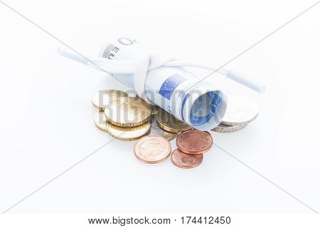 Shoestring budget concept with Euro banknotes and coins