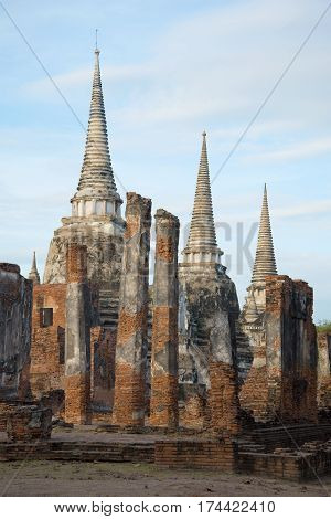 Cloudy morning at the ruins of the wihan Buddhist temple Wat Phra Si Sanphet. Ayutthaya. Thailand