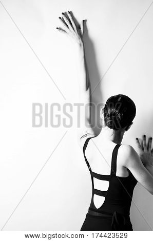 black and white photo of ballet dancer on white background