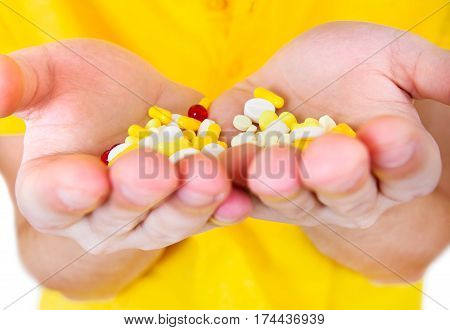 Person hold a Pills in the Hands closeup