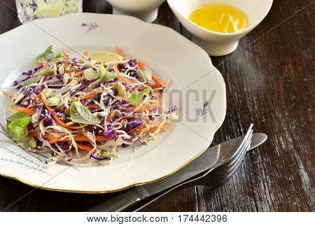 Salad with cabbage carrots and pumpkin sunflower sesame seeds, Cole Slaw