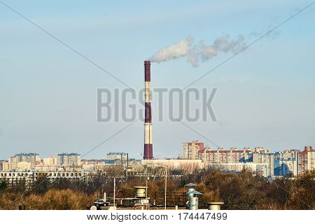 the thick smoke belching from factory chimneys