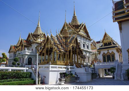 Bangkok, Thailand - July 25, 2010: Roayl Great (Grand) Palace Buddhist temple with famous green tree gardens in center of Bangkok Thailand