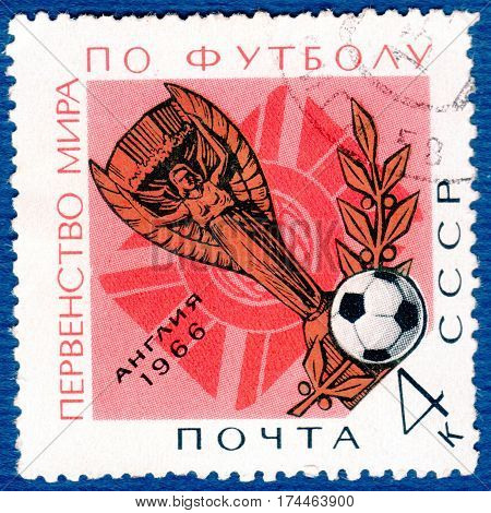 USSR - CIRCA 1966: Postage stamp printed in USSR with a picture of a a football cup, with the inscription 